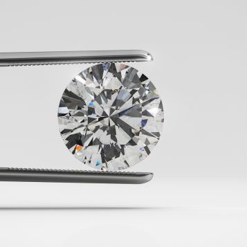 Luxury perfect shaped diamond in tweezers closeup with bright background