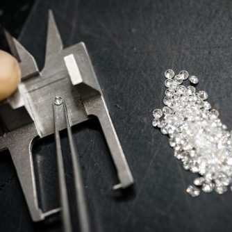 Professional gemstone settings jewellery craft laboratory: Selecting diamonds