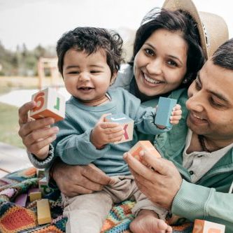 Smiling baby and happy parents
